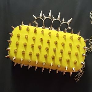 Yellow Four Finger Spike Clutch